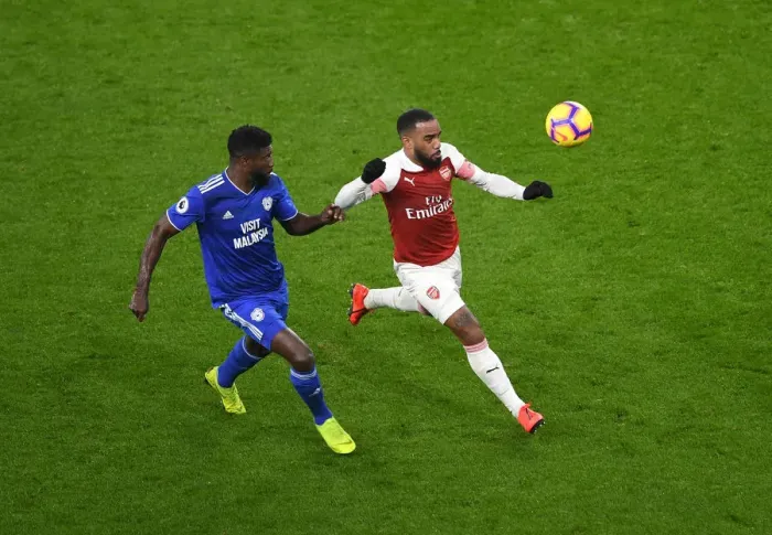 Framed Print : Arsenal's Lacazette Faces Off Against Cardiff's Ecuele Manga in Premier League Clash