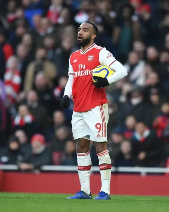 Framed Print : Arsenal's Lacazette Faces Off Against Chelsea in Intense Premier League Showdown
