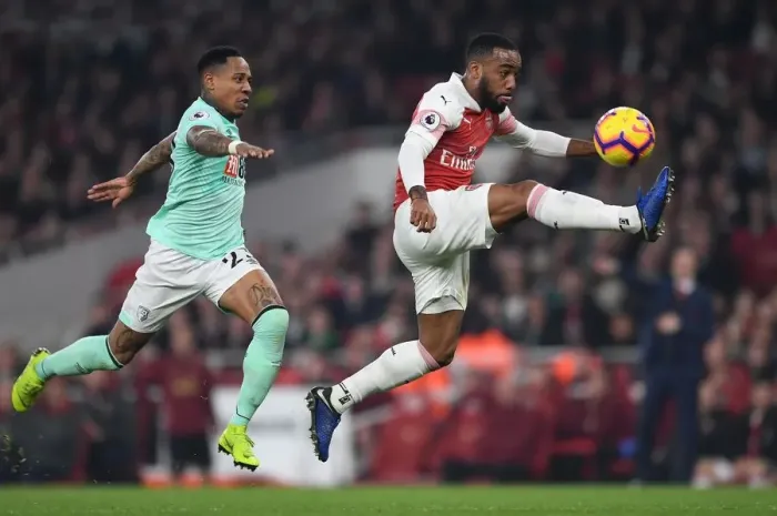Framed Print : Arsenal's Lacazette Faces Off Against Clyne in Intense Arsenal v Bournemouth Clash Framed Print : Arsenal's Lacazette Faces Off Against Clyne in Intense Arsenal v Bournemouth Clash
