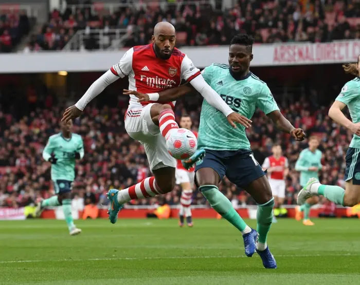 Framed Print : Arsenal's Lacazette Faces Off Against Leicester's Amartey in Premier League Clash Framed Print : Arsenal's Lacazette Faces Off Against Leicester's Amartey in Premier League Clash