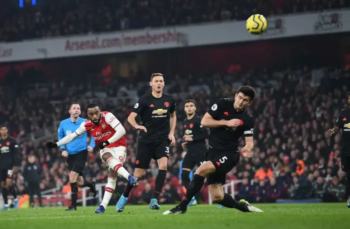 Framed Print : Arsenal's Lacazette Faces Off Against Matic in Intense Arsenal v Manchester United Clash (2019-20) Framed Print : Arsenal's Lacazette Faces Off Against Matic in Intense Arsenal v Manchester United Clash (2019-20)
