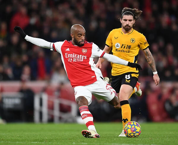 Arsenal's Lacazette Faces Off Against Neves in Intense Arsenal v Wolverhampton Wanderers Clash (2021-22)