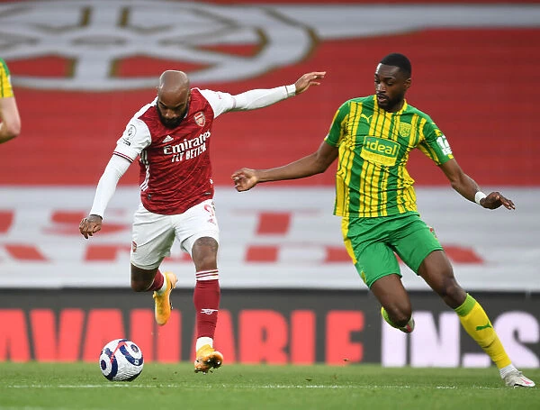 Arsenal's Lacazette Faces Off Against West Brom's Ajayi in Empty Emirates Stadium