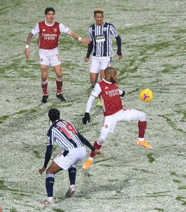 Framed Print : Arsenal's Lacazette Faces Off Against West Brom's Sawyers in Premier League Clash Framed Print : Arsenal's Lacazette Faces Off Against West Brom's Sawyers in Premier League Clash