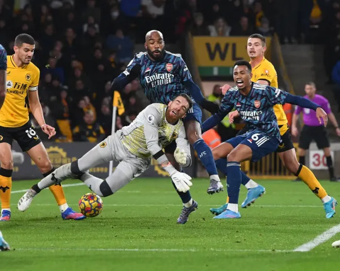 Framed Print : Arsenal's Lacazette Faces Off Against Wolves Sa in Intense Premier League Clash