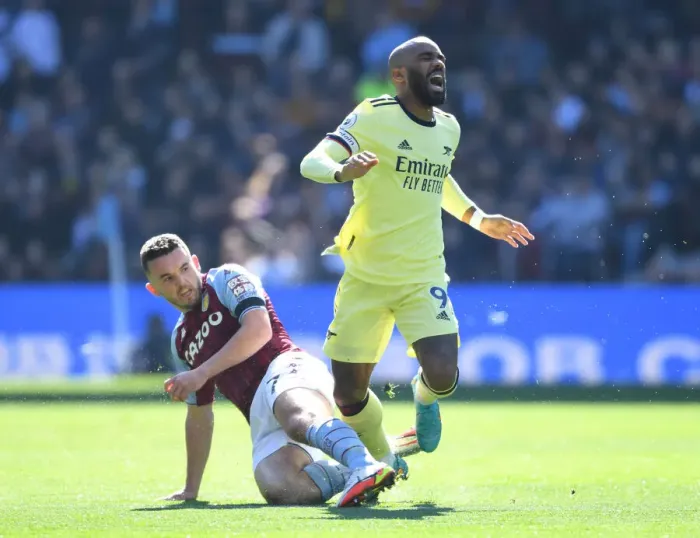 Framed Print : Arsenal's Lacazette Fouls by McGinn in Aston Villa vs Arsenal (Premier League, 2021-22)