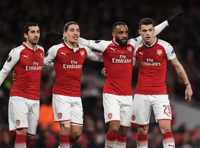 Framed Print : Arsenal's Lacazette, Mkhitaryan, Bellerin, and Xhaka: Celebrating Four Goals Against CSKA Moscow in Europa League Quarterfinal