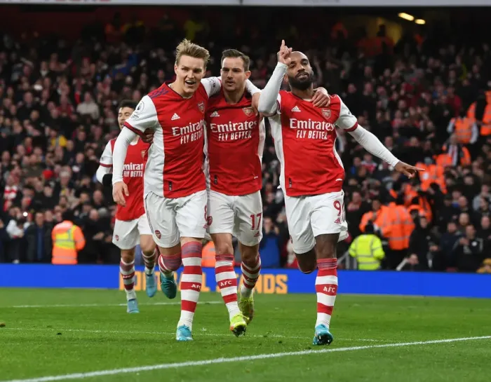 Framed Print : Arsenal's Lacazette, Odegaard, and Cedric Celebrate Goals Against Leicester City (2021-22)