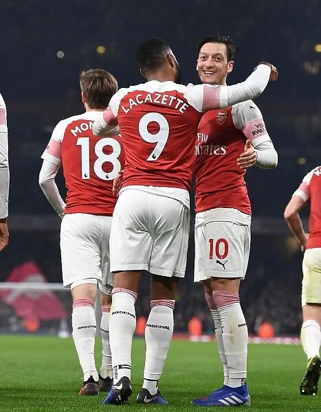 Arsenal's Lacazette and Ozil Celebrate Five-Goal Lead Over Bournemouth