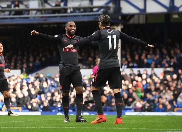 Arsenal's Lacazette and Ozil: Celebrating a Goal Triumph Over Everton (2017-18)