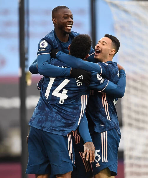 Arsenal's Lacazette, Pepe, Aubameyang, and Martinelli Celebrate Goals Against West Ham in Premier League