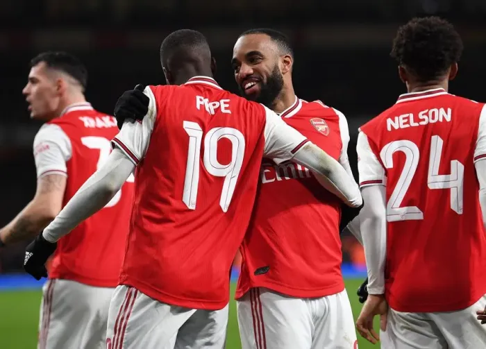 Framed Print : Arsenal's Lacazette and Pepe Celebrate Goal Against Leeds United in FA Cup Third Round