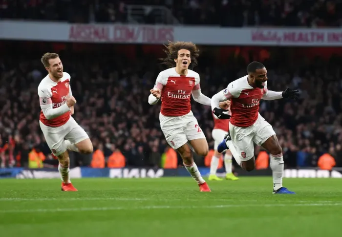 Framed Print : Arsenal's Lacazette, Ramsey, and Guendouzi Celebrate Goals Against Tottenham in 2018-19 Premier League Framed Print : Arsenal's Lacazette, Ramsey, and Guendouzi Celebrate Goals Against Tottenham in 2018-19 Premier League