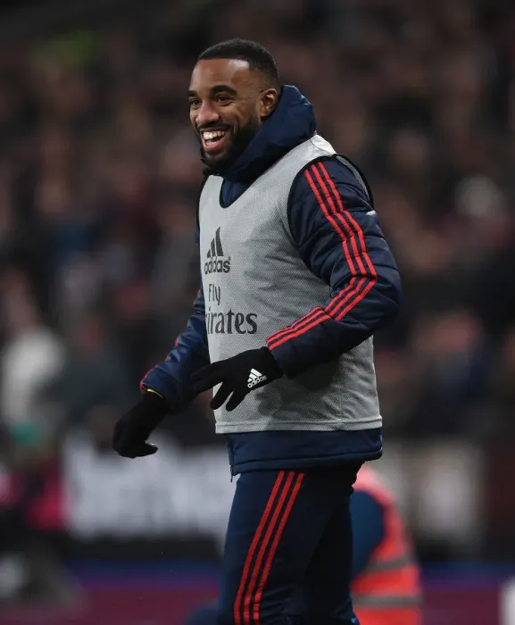 Framed Print : Arsenal's Lacazette Ready to Enter the Fray: West Ham United vs Arsenal FC, Premier League 2019-20 Framed Print : Arsenal's Lacazette Ready to Enter the Fray: West Ham United vs Arsenal FC, Premier League 2019-20