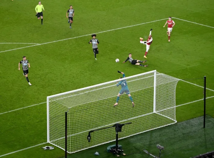 Framed Print : Arsenal's Lacazette Takes Aim in FA Cup Clash Against Newcastle