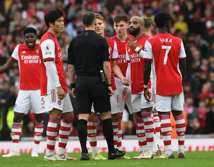 Framed Print : Arsenal's Lacazette and Tomiyasu Confer with Referee during Arsenal vs Manchester City (2021-22) Framed Print : Arsenal's Lacazette and Tomiyasu Confer with Referee during Arsenal vs Manchester City (2021-22)