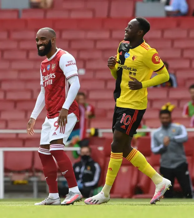 Framed Print : Arsenal's Lacazette and Welbeck Share a Joke Before Arsenal v Watford (2019-20) Framed Print : Arsenal's Lacazette and Welbeck Share a Joke Before Arsenal v Watford (2019-20)
