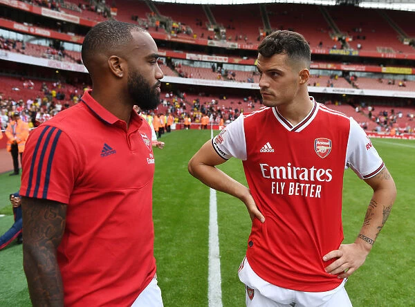 Arsenal's Lacazette and Xhaka Celebrate Emirates Cup Victory over Olympique Lyonnais