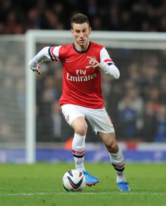 Framed Print : Arsenal's Laurent Koscielny in Action Against Chelsea - Capital One Cup 2013-14