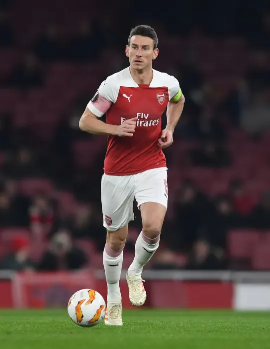 Framed Print : Arsenal's Laurent Koscielny in Action Against Qarabag in UEFA Europa League