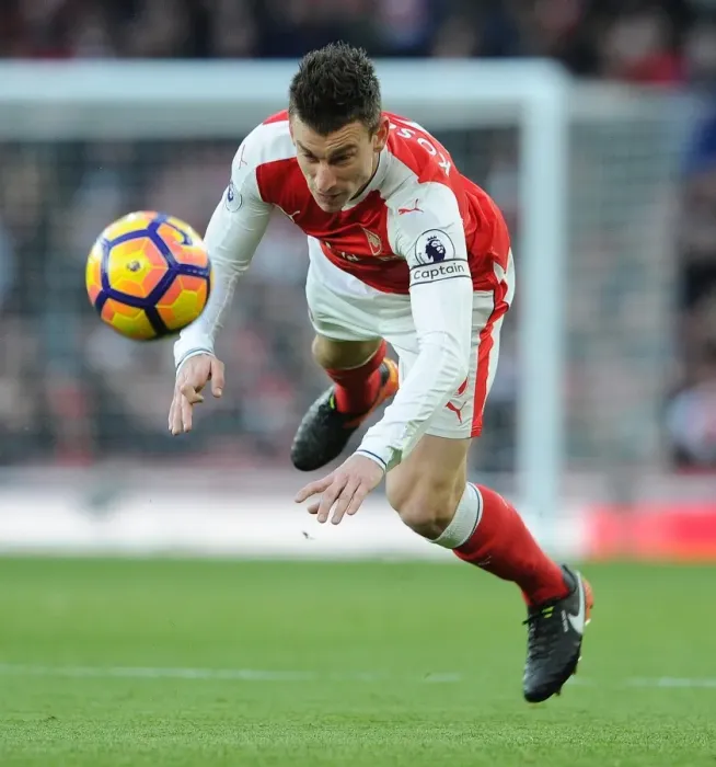 Framed Print : Arsenal's Laurent Koscielny in Action against West Bromwich Albion (2016-17)
