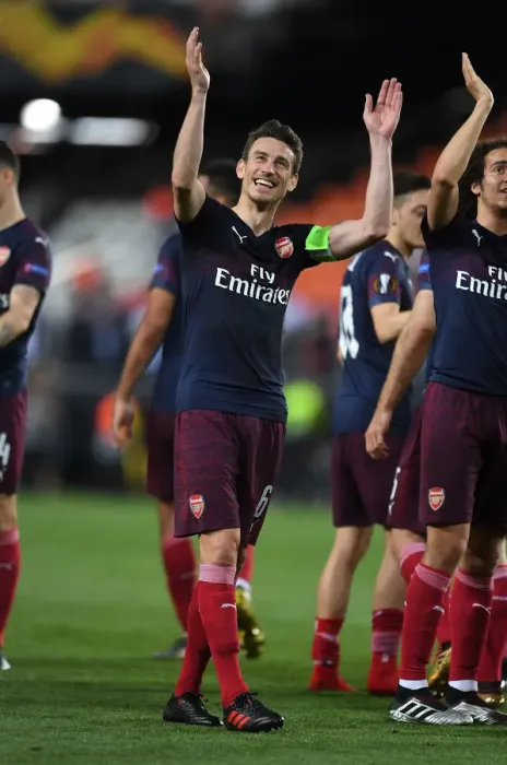 Framed Print : Arsenal's Laurent Koscielny Celebrates with Fans after UEFA Europa League Semi-Final Second Leg against Valencia