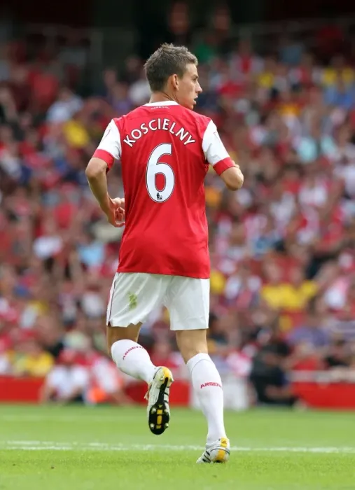 Framed Print : Arsenal's Laurent Koscielny Faces Off Against AC Milan at the Emirates Cup, 2010