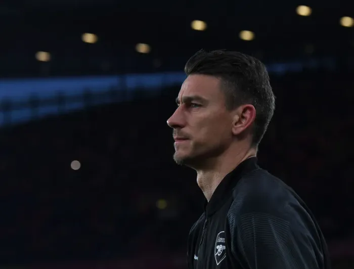 Framed Print : Arsenal's Laurent Koscielny: Focused Before Europa League Quarterfinal vs Napoli