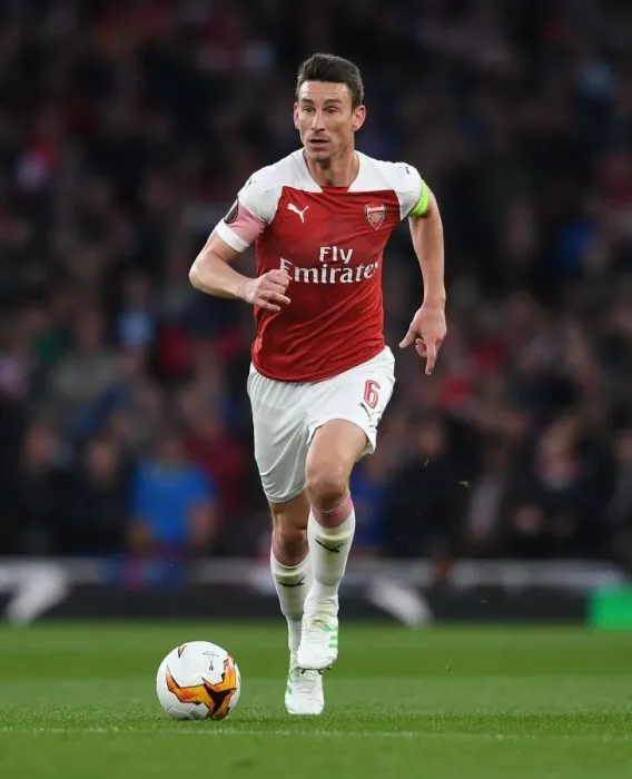 Framed Print : Arsenal's Laurent Koscielny Focuses in UEFA Europa League Semi-Final vs Valencia