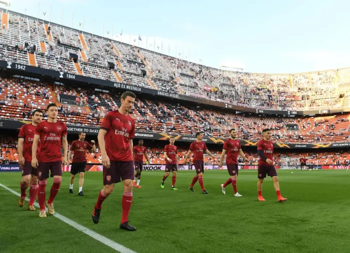 Framed Print : Arsenal's Laurent Koscielny Leads Pre-Match Warm-Up at Valencia's Estadio Mestalla (UEFA Europa League Semi-Final, Second Leg) Framed Print : Arsenal's Laurent Koscielny Leads Pre-Match Warm-Up at Valencia's Estadio Mestalla (UEFA Europa League Semi-Final, Second Leg)