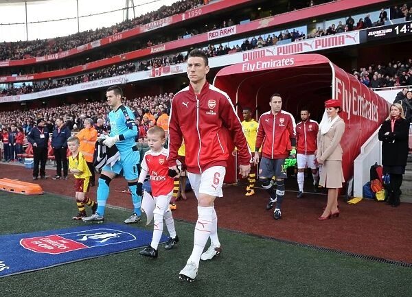 Arsenal's Laurent Koscielny Leads Team Out Against Burnley in FA Cup Fourth Round