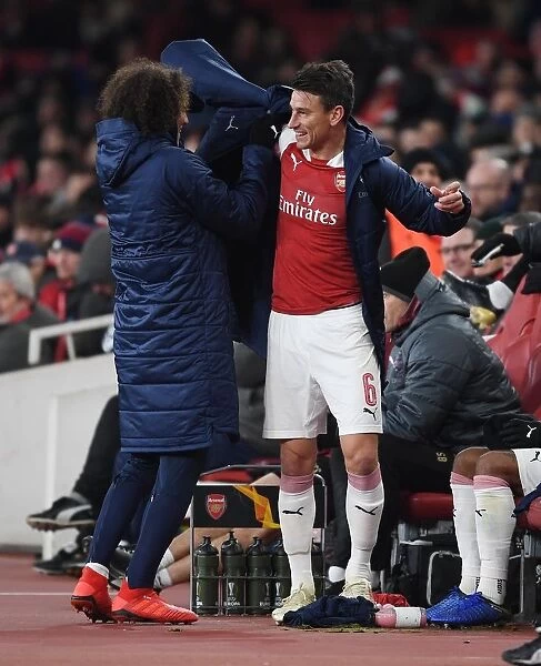 Arsenal's Laurent Koscielny and Matteo Guendouzi Share a Light-Hearted Moment during Arsenal v Qarabag UEFA Europa League Match