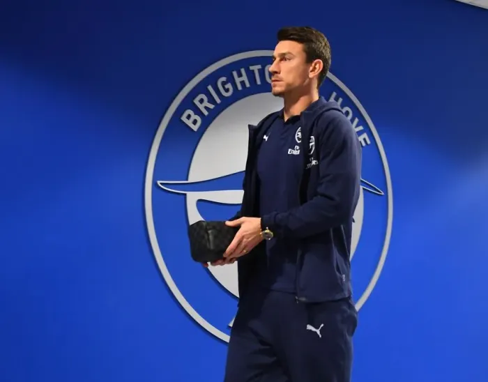 Framed Print : Arsenal's Laurent Koscielny Prepares for Battle: Brighton Showdown in Premier League