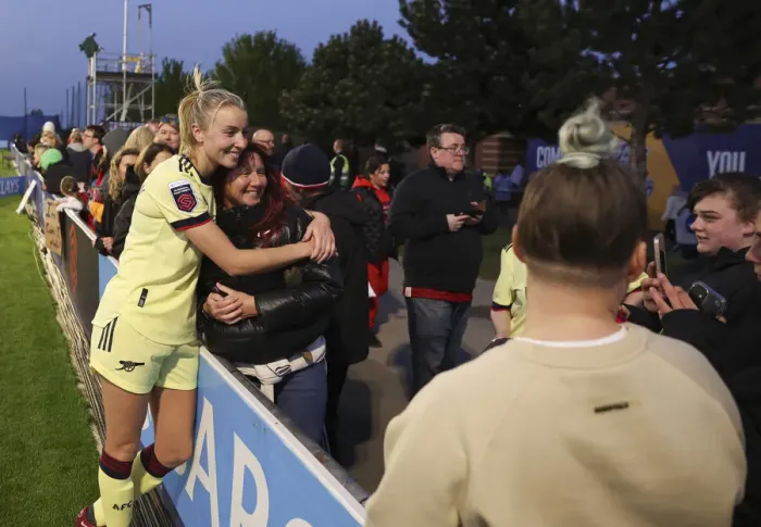 Framed Print : Arsenal's Leah Williamson Celebrates with Mother after Everton Victory (Everton Women vs Arsenal Women, FA WSL 2021-22)