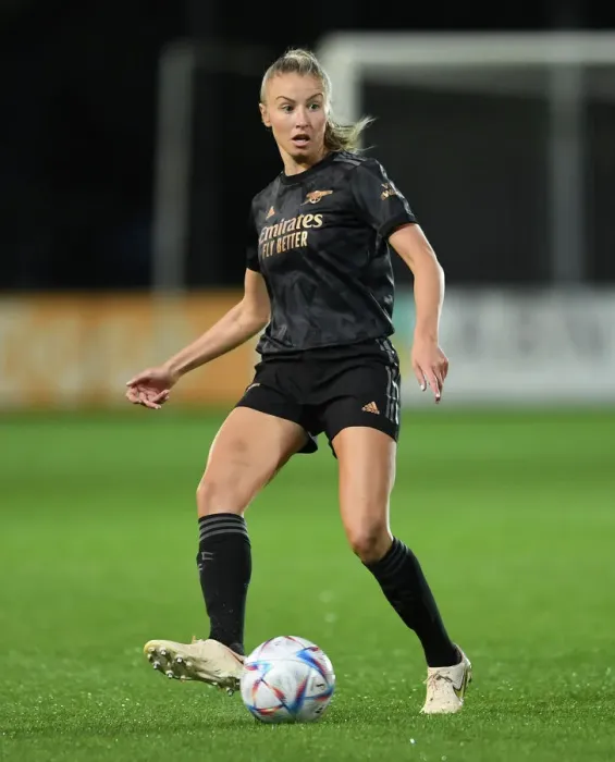 Framed Print : Arsenal's Leah Williamson Clashes with Ajax in UEFA Women's Champions League Battle
