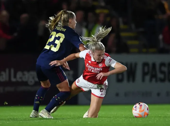 Framed Print : Arsenal's Leah Williamson Fouls by Ajax's Victoria Pelova in Women's Champions League Clash