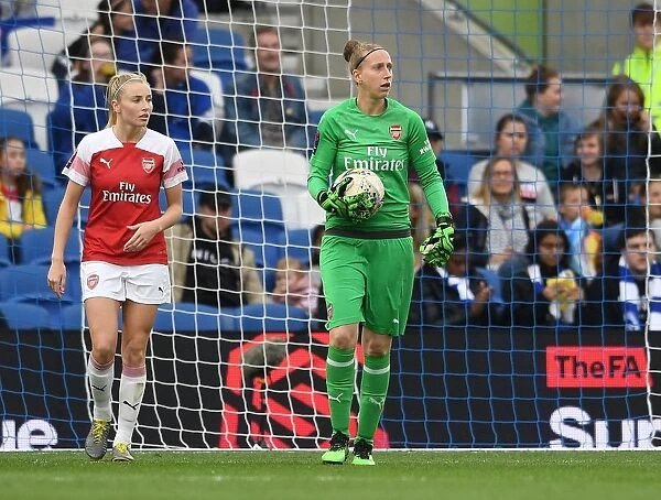 Arsenal's Leah Williamson and Sari van Veenendaal in Action against Brighton & Hove Albion Women