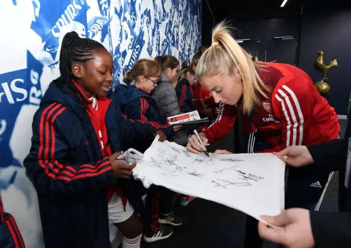 Framed Print : Arsenal's Leah Williamson Signs Autographs Before Tottenham-Arsenal FA Womens Super League Clash