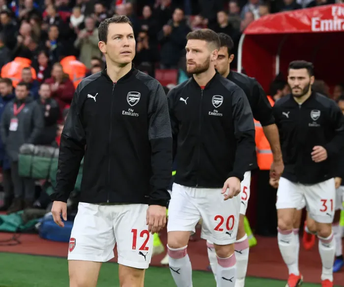 Framed Print : Arsenal's Lichtsteiner and Mustafi in Action against Huddersfield Town