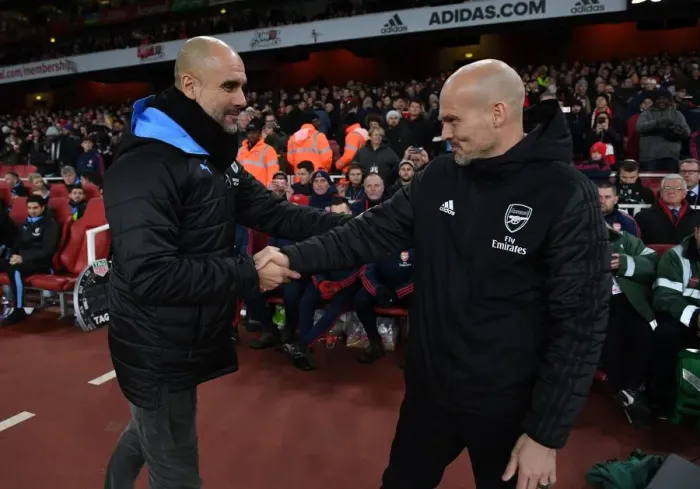 Framed Print : Arsenal's Ljungberg and Guardiola Share a Pre-Match Handshake Ahead of Arsenal vs. Manchester City (2019-20) Framed Print : Arsenal's Ljungberg and Guardiola Share a Pre-Match Handshake Ahead of Arsenal vs. Manchester City (2019-20)