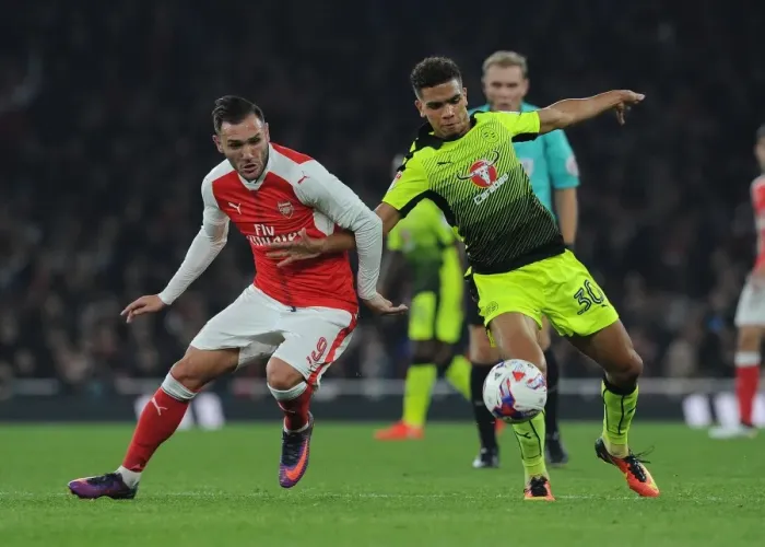 Framed Print : Arsenal's Lucas Perez Clashes with Reading's Tennai Watson in EFL Cup Showdown Framed Print : Arsenal's Lucas Perez Clashes with Reading's Tennai Watson in EFL Cup Showdown