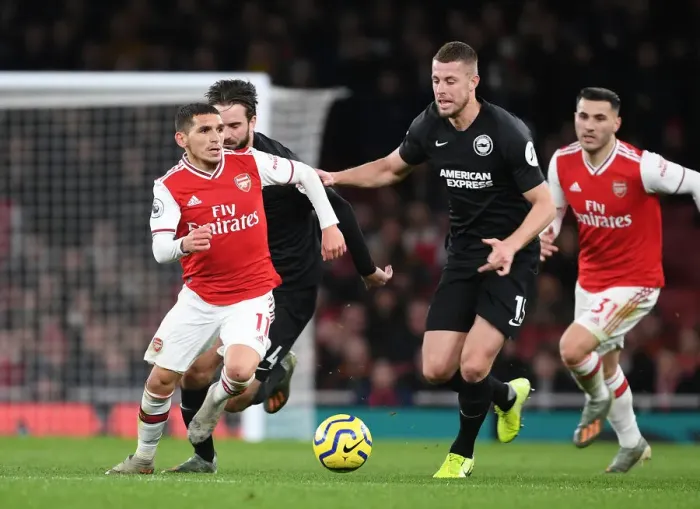 Framed Print : Arsenal's Lucas Torreira Outmaneuvers Brighton's Defenders during Premier League Clash Framed Print : Arsenal's Lucas Torreira Outmaneuvers Brighton's Defenders during Premier League Clash