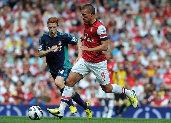 Arsenal's Lukas Podolski in Action: Arsenal vs. Sunderland (2012-13 Premier League)