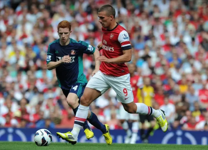 Framed Print : Arsenal's Lukas Podolski in Action: Arsenal vs. Sunderland (2012-13 Premier League)