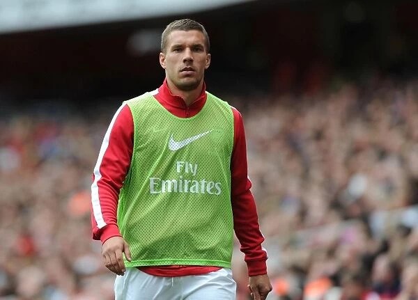 Arsenal's Lukas Podolski in Action: Arsenal vs. Aston Villa (2013-14 Premier League)