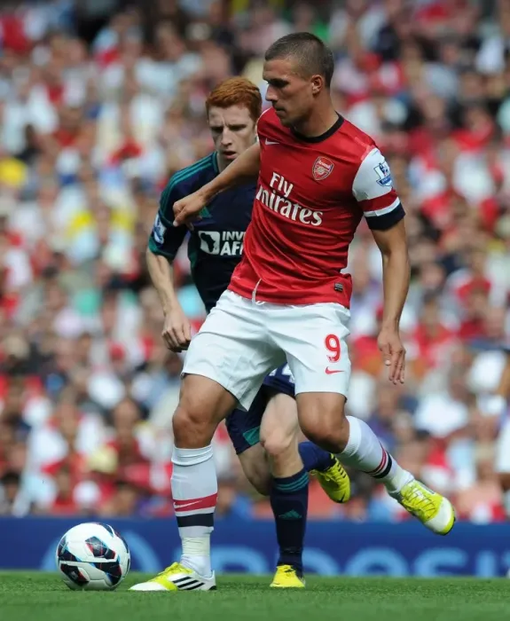 Framed Print : Arsenal's Lukas Podolski in Action against Sunderland (2012-13 Premier League)