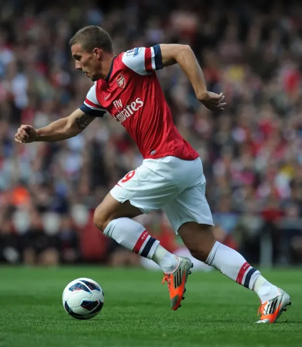 Framed Print : Arsenal's Lukas Podolski Faces Off Against Chelsea in the Premier League Framed Print : Arsenal's Lukas Podolski Faces Off Against Chelsea in the Premier League