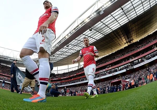 Arsenal's Lukas Podolski Gears Up for Arsenal vs Manchester City (2013 / 14)
