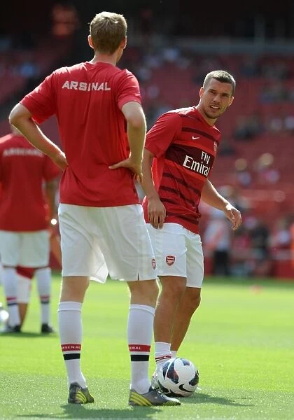 Arsenal's Lukas Podolski Scores in 6-1 Victory over Southampton in Barclays Premier League