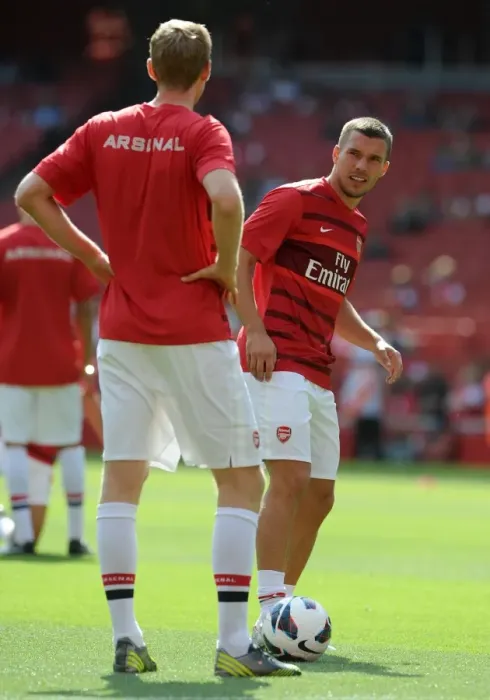 Framed Print : Arsenal's Lukas Podolski Scores in 6-1 Victory over Southampton in Barclays Premier League
